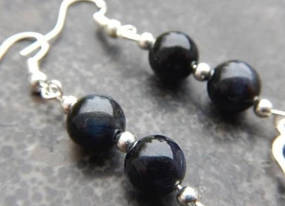 Boucles d’oreilles en œil de faucon